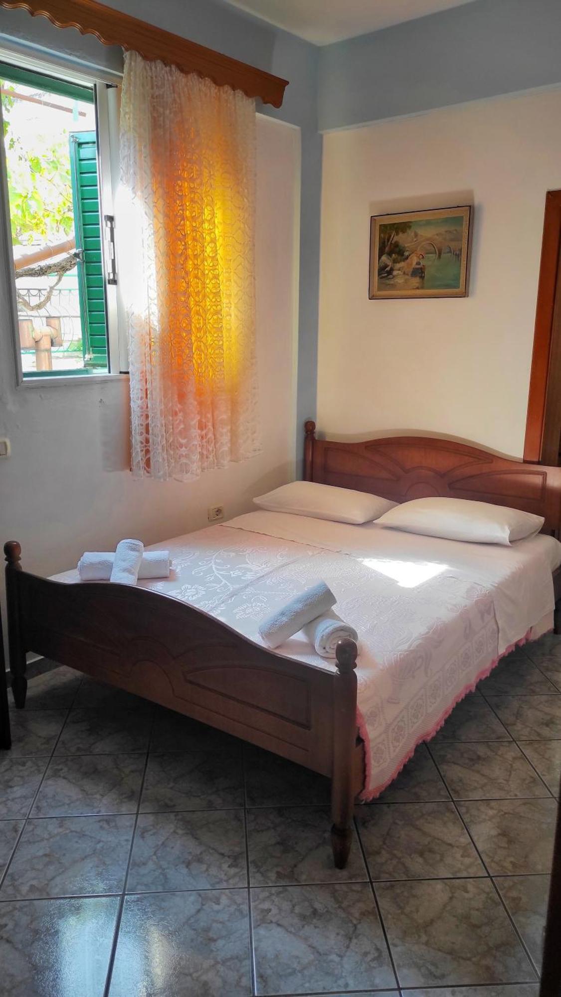 Q Bay Apartments Qëparo Pokoj fotografie